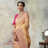 Handwoven_Peach_MulMul_Tissue_with_Pink_Kadhiyal_Border_and_Polka_Dots_WeaverStory_01