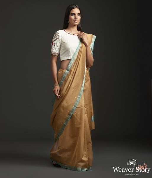 Brown_cotton_by_silk_chanderi_saree_with_nakshi_booti_and_blue_border_WeaverStory_02