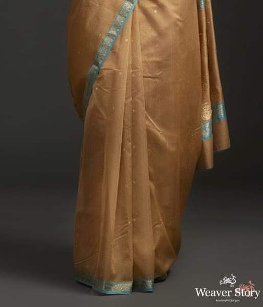 Brown_cotton_by_silk_chanderi_saree_with_nakshi_booti_and_blue_border_WeaverStory_04