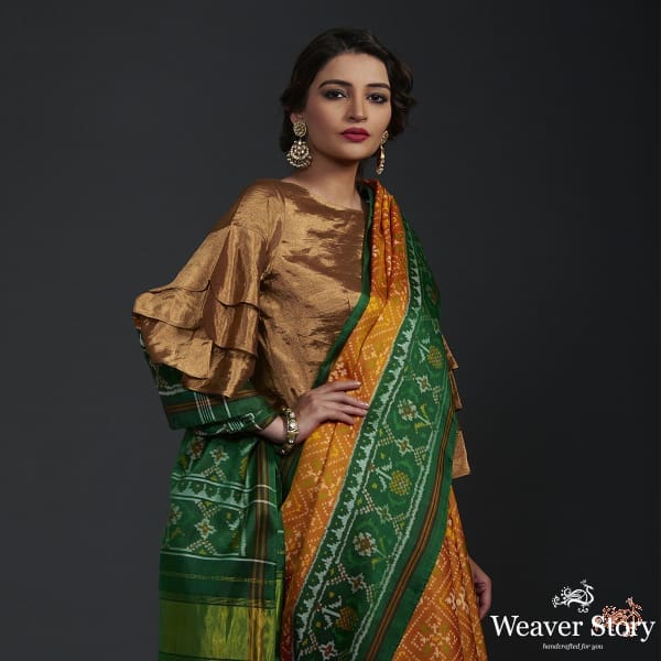 Pure_silk_Gujarat_Patola_saree_in_Yellow_and_green_WeaverStory_01