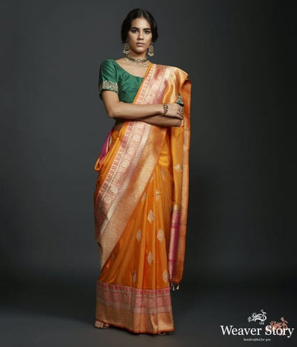 Mango_yellow_dual_tone_kadhiyal_border_saree_with_a_kadhwa_booti_and_pink_selvedge_WeaverStory_02