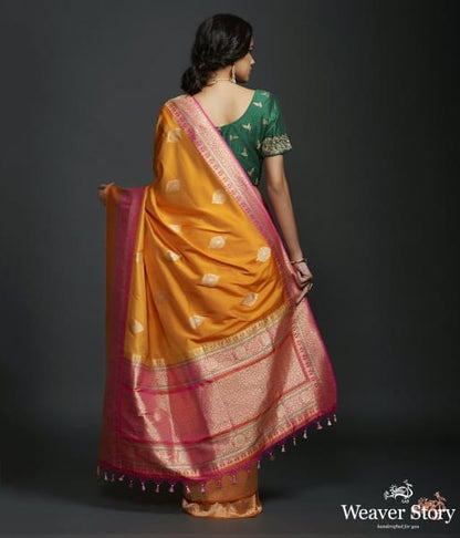 Mango_yellow_dual_tone_kadhiyal_border_saree_with_a_kadhwa_booti_and_pink_selvedge_WeaverStory_04