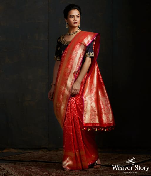 Handwoven_Banarasi_saree_in_red_with_broad_floral_border_WeaverStory_02