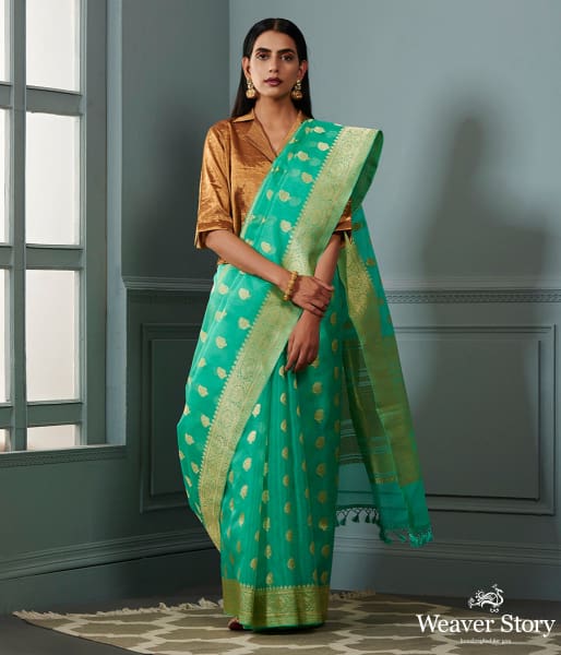 Green_banarasi_kora_saree_with_beldar_border_and_kairi_boota_WeaverStory_02