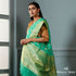 Green_banarasi_kora_saree_with_beldar_border_and_kairi_boota_WeaverStory_01