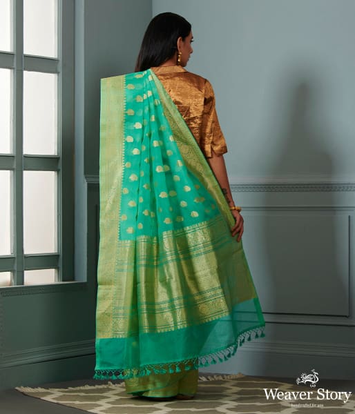 Green_banarasi_kora_saree_with_beldar_border_and_kairi_boota_WeaverStory_03