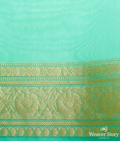 Green_banarasi_kora_saree_with_beldar_border_and_kairi_boota_WeaverStory_05