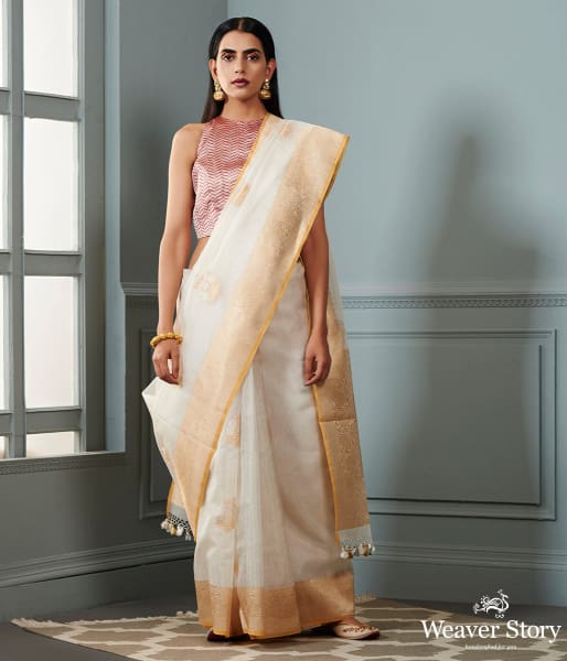 Ivory_and_gold_banarasi_kora_saree_with_beldar_border_and_kadhwa_booti_WeaverStory_02