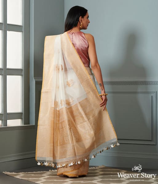 Ivory_and_gold_banarasi_kora_saree_with_beldar_border_and_kadhwa_booti_WeaverStory_03