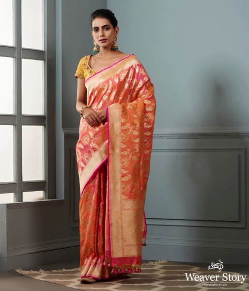 Handwoven_Banarasi_saree_in_Oramge_and_peach_dual_tone_with_floral_jaal_WeaverStory_02