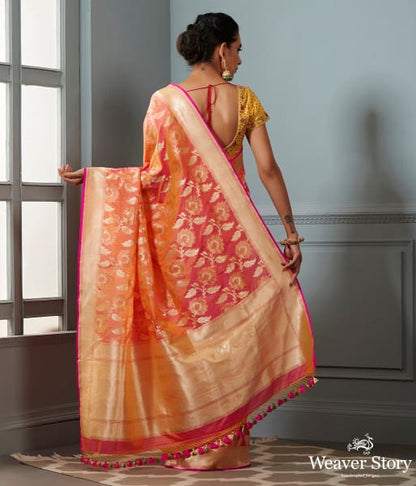 Handwoven_Banarasi_saree_in_Oramge_and_peach_dual_tone_with_floral_jaal_WeaverStory_03