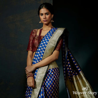 Royal_Blue_katan_silk_saree_with_small_floral_motifs_and_kadhwa_border_WeaverStory_01