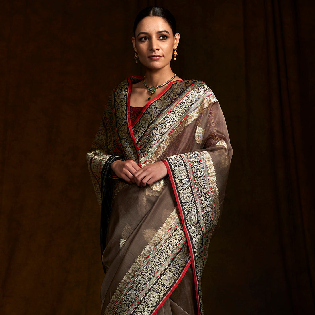 Taupe_banarasi_kora_silk_saree_with_black_border_and_pallu_and_red_selvedge_WeaverStory_01