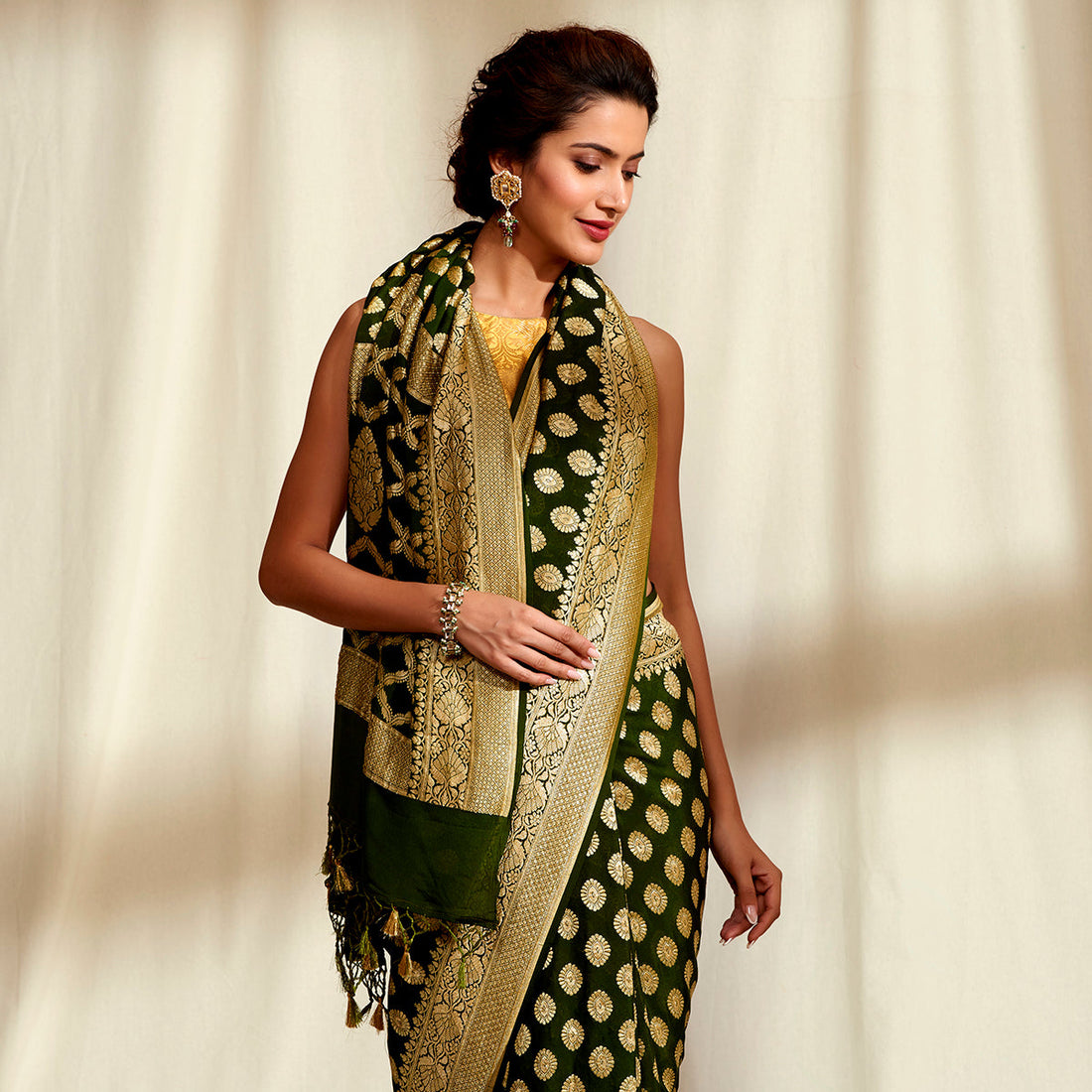 Handwoven_Banarasi_Georgette_Saree_in_Dark_Green_WeaverStory_01