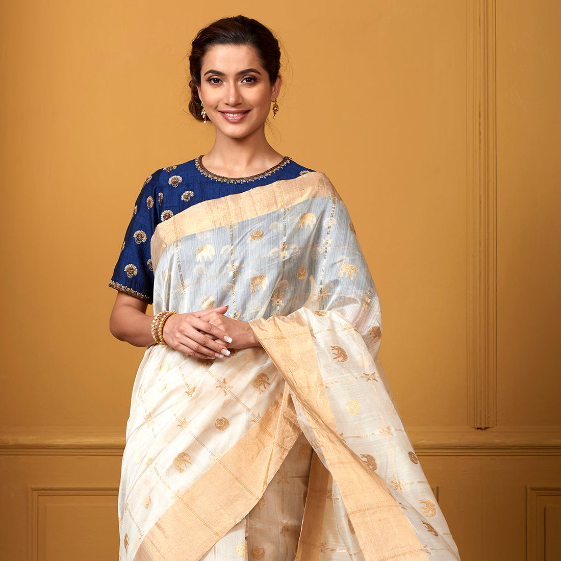 Handloom_White_Zari_Checks_Saree_with_Elephant_Motifs_WeaverStory_01