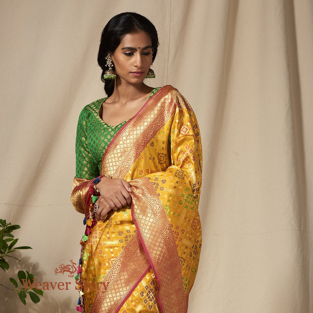 Handwoven_Mustard_Meenakari_Banarasi_Patola_Saree_with_Peach_Border_WeaverStory_01