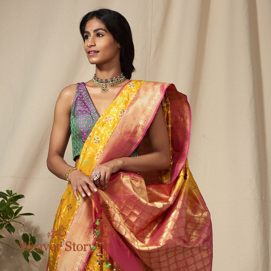 Handwoven_Banarasi_Patola_Saree_in_Mustard_and_Peach_WeaverStory_01
