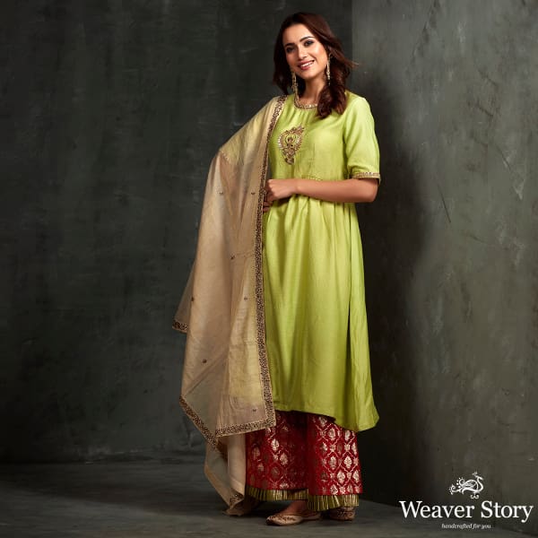 Hand_front_boota_embroidered_munga_silk_suit_in_green_color_with_brocade_palazzo_WeaverStory_01