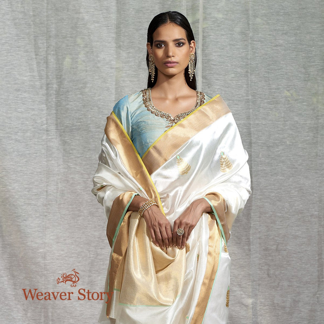 Handloom_White_Silk_Saree_with_Meena_Boota_and_Green_Selvedge_WeaverStory_01