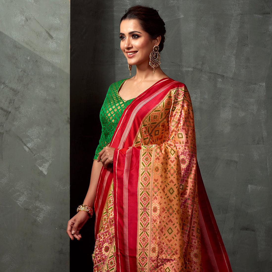 Handwoven_Peach_Meenakari_Patola_Saree_with_Red_Border_WeaverStory_01