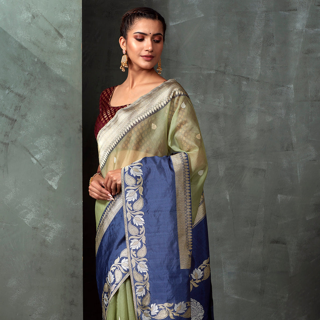 Handwoven_Green_Kora_Saree_with_Blue_Border_WeaverStory_01