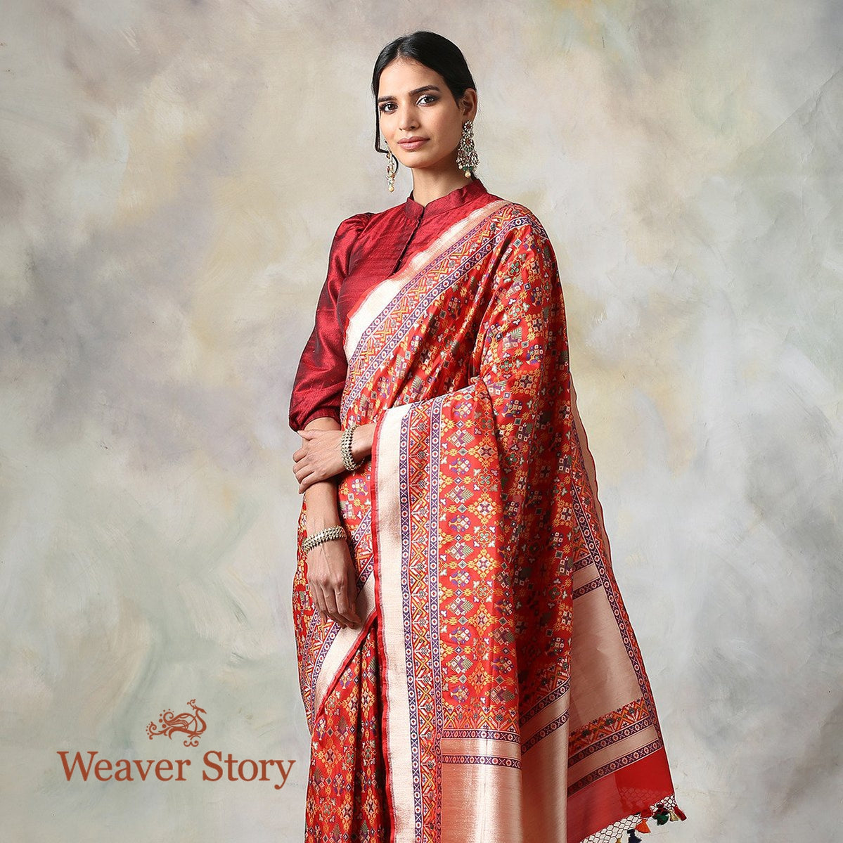 Handwoven_Red_Meenakari_Patola_Saree_with_a_Hint_of_Blue_WeaverStory_01
