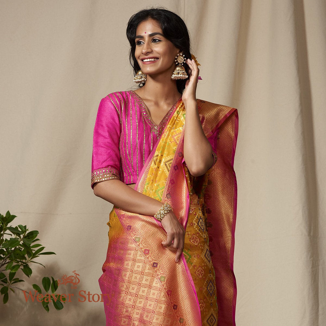 Handwoven_Yellow_and_Pink_Cutwork_Banarasi_Patola_Saree_WeaverStory_01