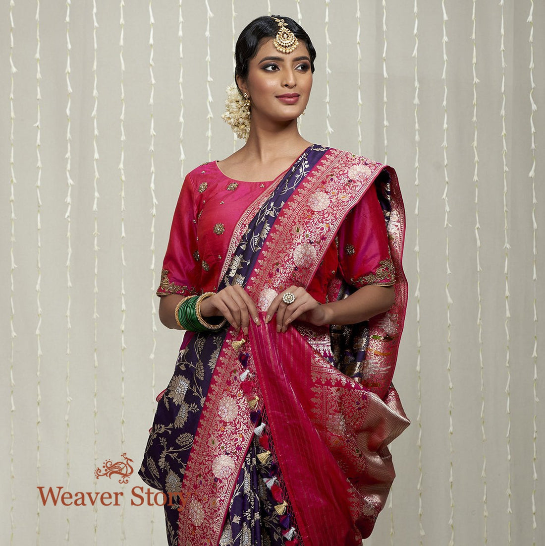 Handwoven_Purple_Heavy_Jangla_Saree_with_Pink_Border_WeaverStory_01