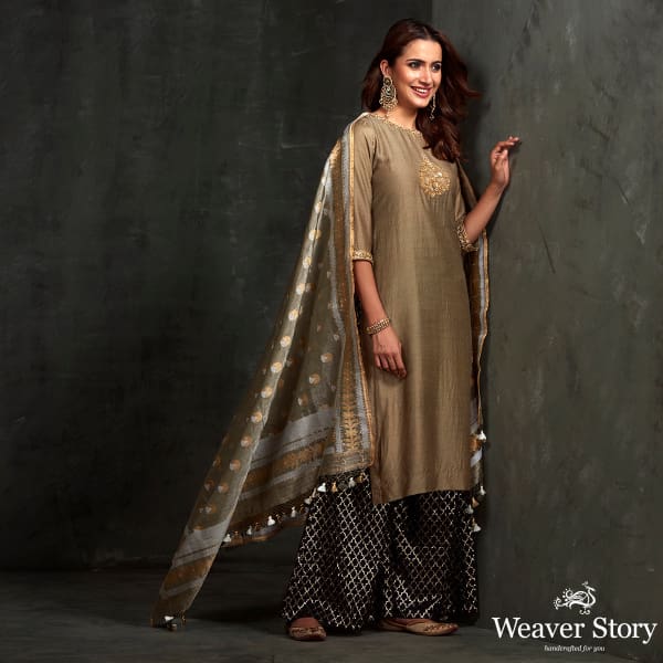 Hand_embroidered_munga_silk_suit_in_olive_green_color_with_brocade_palazzo_WeaverStory_01