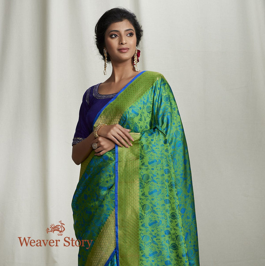 Handwoven_Green_and_Blue_Satin_Reshmi_Jamawar_Saree_WeaverStory_01