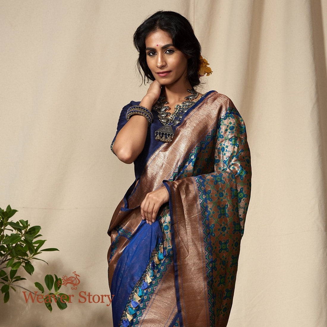 Handwoven_Antique_Zari_Base_Blue_and_Green_Banarasi_Patola_Saree_WeaverStory_01