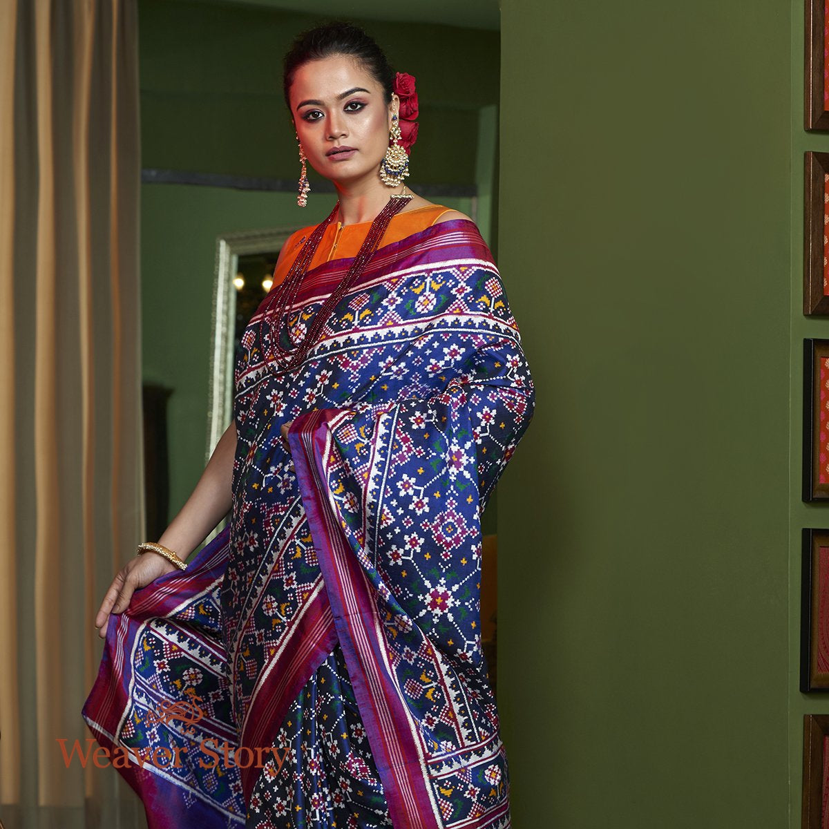 Handwoven_Double_Ikat_Patan_Patola_Saree_in_Blue_and_Purple_WeaverStory_01