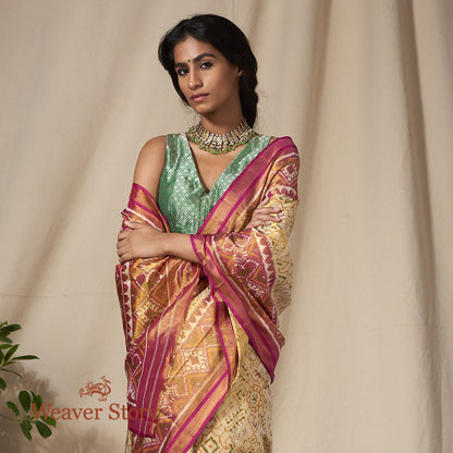 Handwoven_Silk_Tissue_Gujarat_Patola_Saree_in_Cream_and_Pink_WeaverStory_01