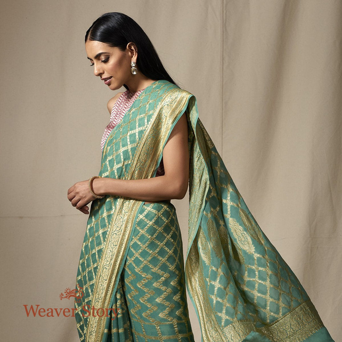 Handloom_Banarasi_Georgette_Jaal_in_Green_with_Gold_Zari_Jaal_WeaverStory_01