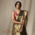Handwoven_Black_and_Gold_Chanderi_Silk_Tissue_Saree_with_Gold_Zari_Floral_Motifs_WeaverStory_01