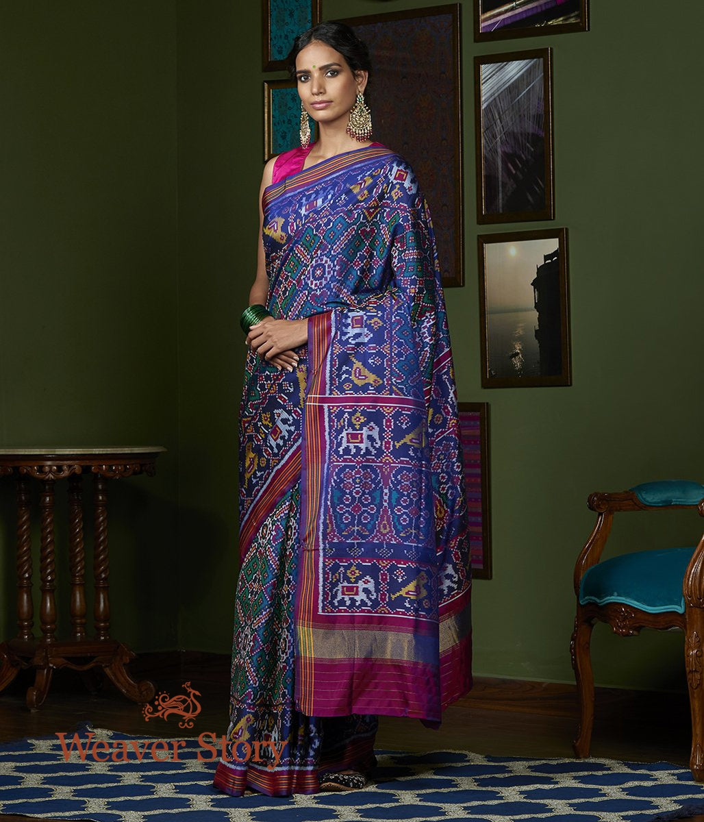 Handwoven_Blue_and_Teal_Dual_Tone_Gujarat_Patola_Saree_with_Purple_Border_WeaverStory_02
