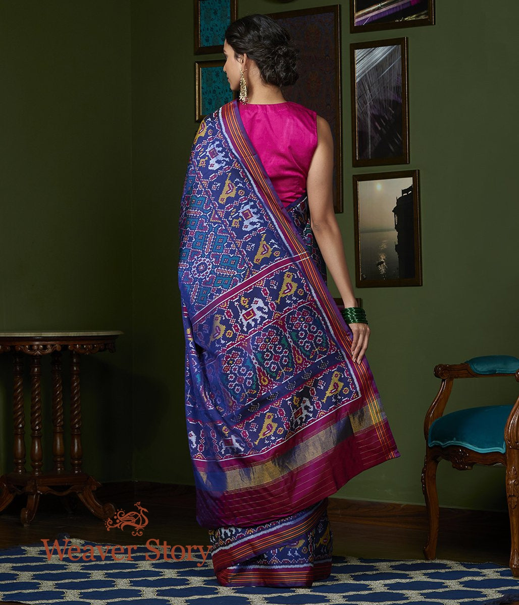 Handwoven_Blue_and_Teal_Dual_Tone_Gujarat_Patola_Saree_with_Purple_Border_WeaverStory_03