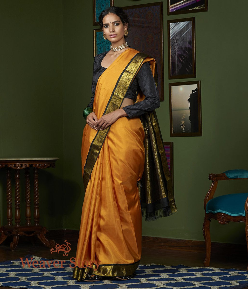 Handloom_Yellow_Kanjivaram_Silk_Saree_with_Black_Border_and_Pallu_WeaverStory_02