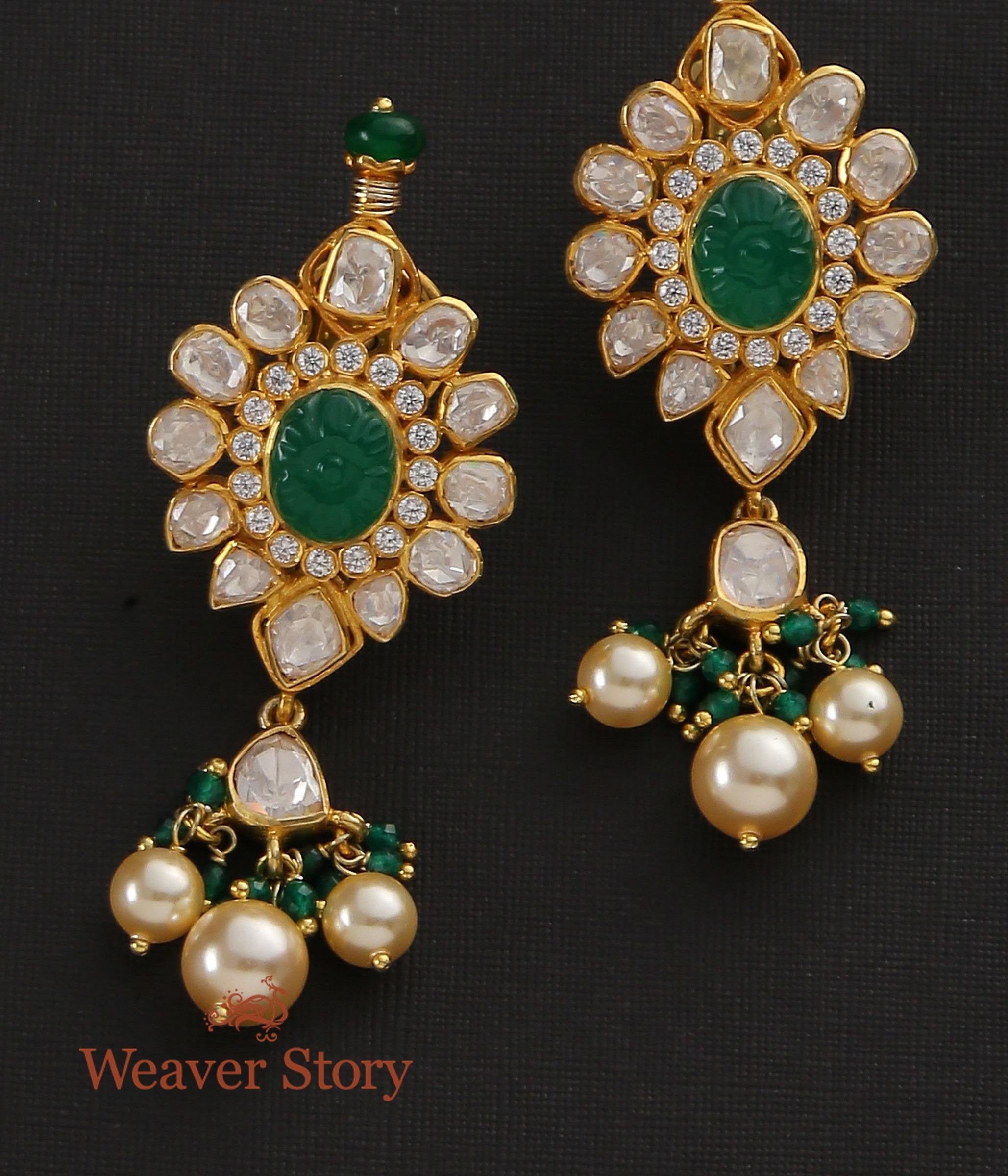 Kashmiri jhumka earrings deals with emeralds & polki