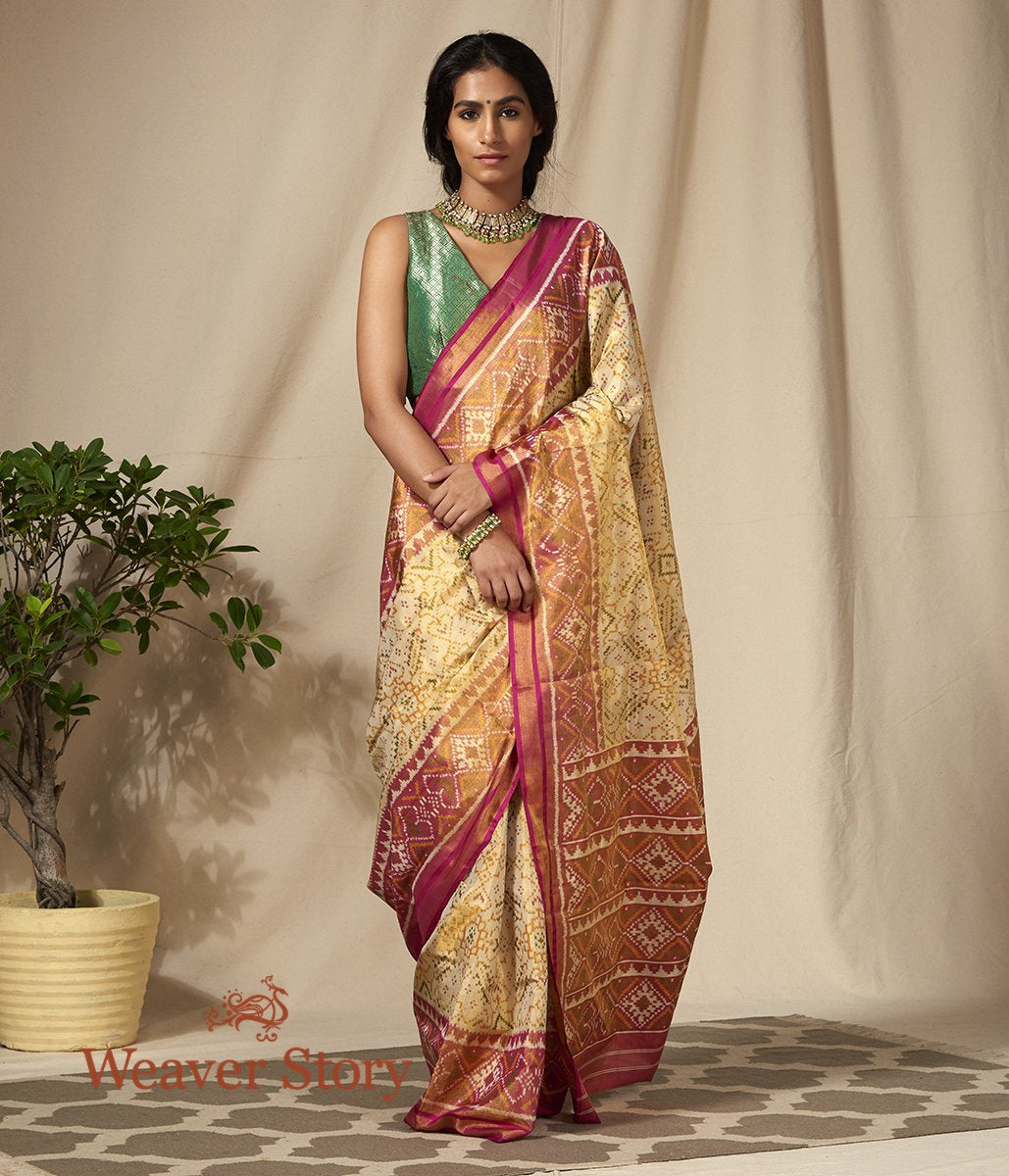 Handwoven_Silk_Tissue_Gujarat_Patola_Saree_in_Cream_and_Pink_WeaverStory_02