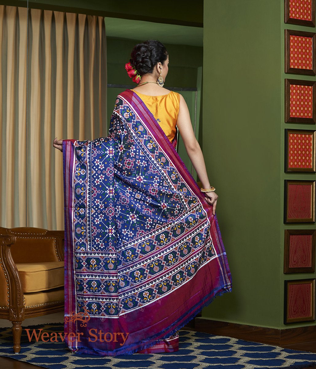 Handwoven_Double_Ikat_Patan_Patola_Saree_in_Blue_and_Purple_WeaverStory_03