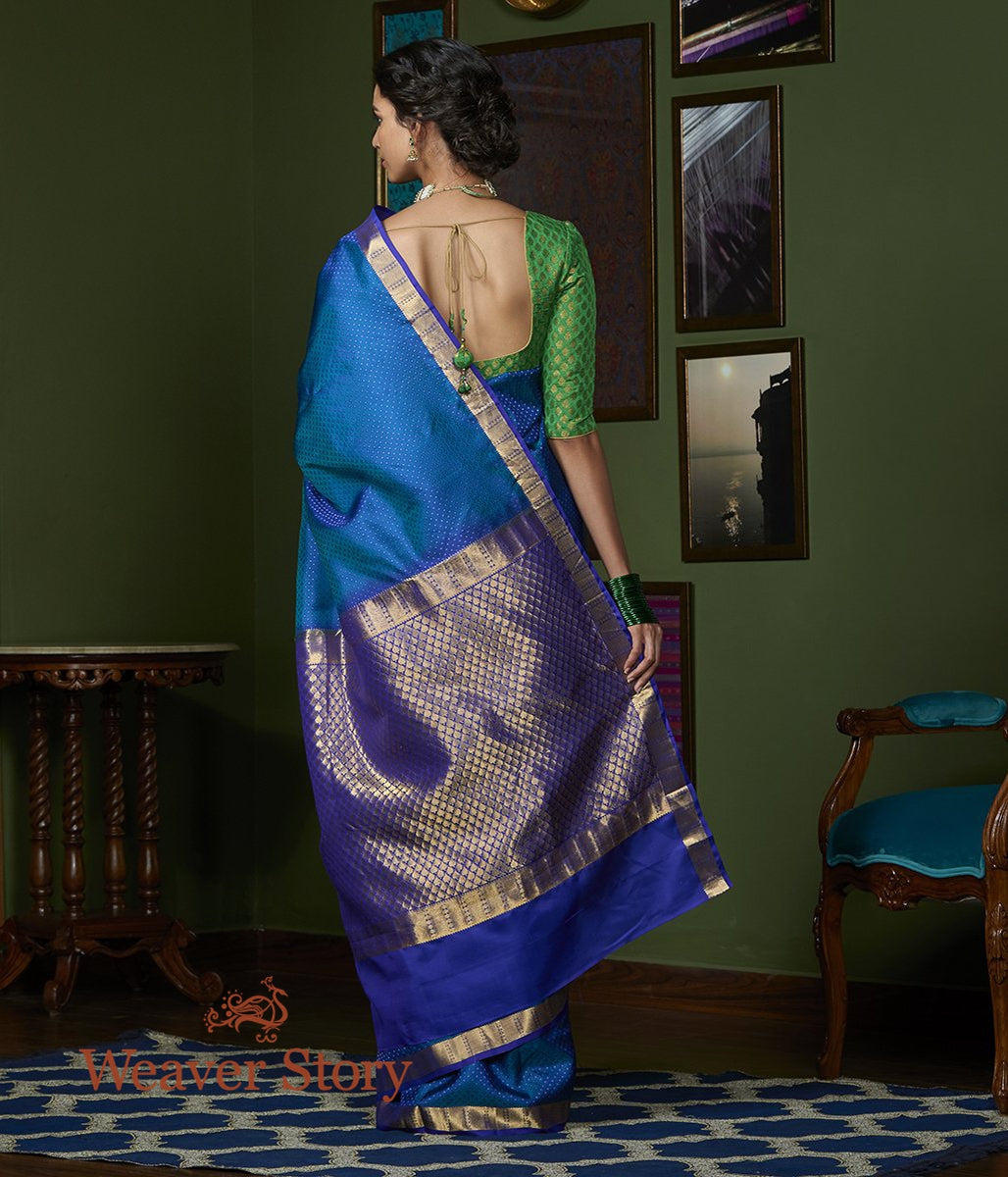 Handwoven_Peacock_Blue_Self_Weave_Kanjivaram_Saree_with_Purple_Border_WeaverStory_03