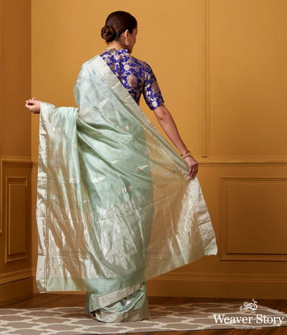 Handwoven_Light_Green_Silver_Zari_Motif_Silk_Saree_WeaverStory_03