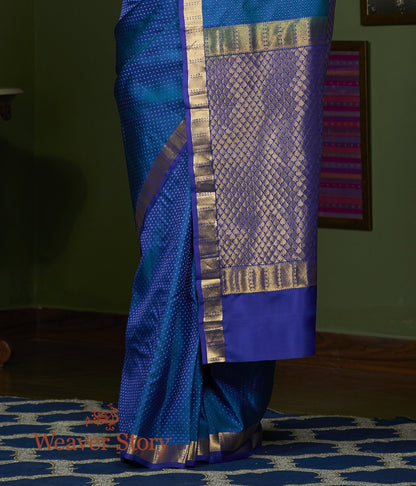 Handwoven_Peacock_Blue_Self_Weave_Kanjivaram_Saree_with_Purple_Border_WeaverStory_04