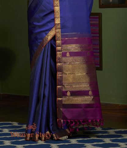 Handwoven_Purple_Pure_Zari_Kanjivaram_Saree_with_Rust_Floral_Border_WeaverStory_04