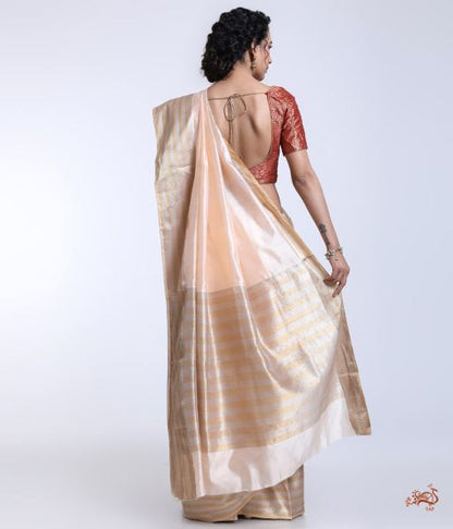Handwoven_Peach_Chanderi_silk_saree_with_a_Gold_and_Silver_border_WeaverStory_04