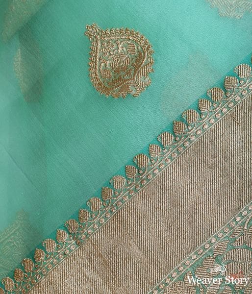 Handwoven_pure_Kora_silk_saree_in_Green_with_kadhwa_booti_WeaverStory_04