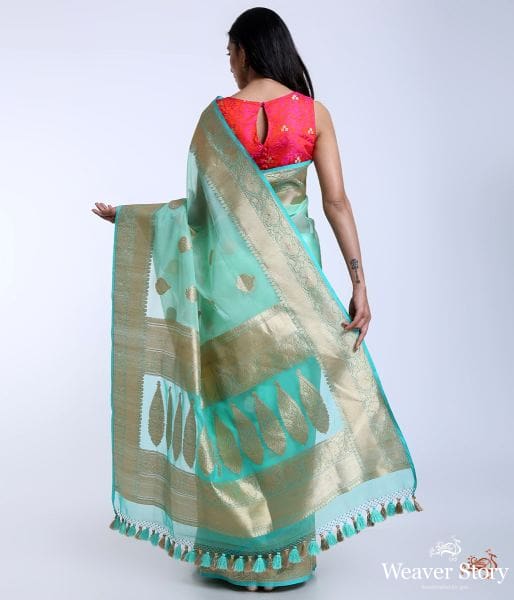 Handwoven_pure_Kora_silk_saree_in_Green_with_kadhwa_booti_WeaverStory_03