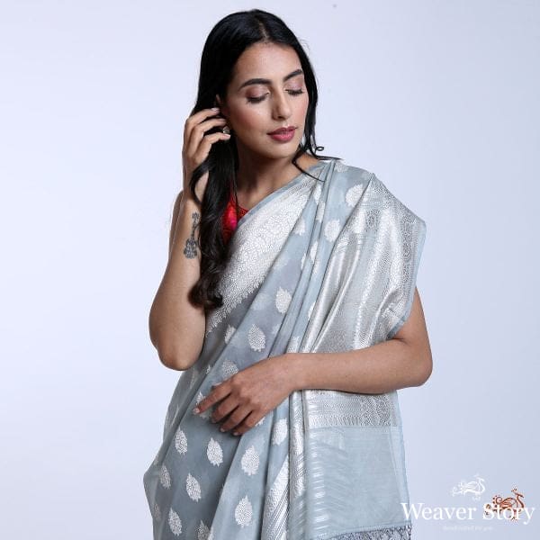 Handwoven_pure_Kora_silk_saree_with_kadhwa_booti_with_silver_zari_WeaverStory_01