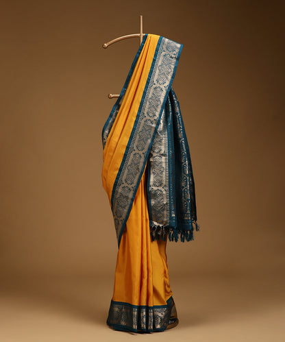 Mustard_And_Teal_Pure_Mulberry_Silk_Saree_With_Gold_Zari_WeaverStory_01